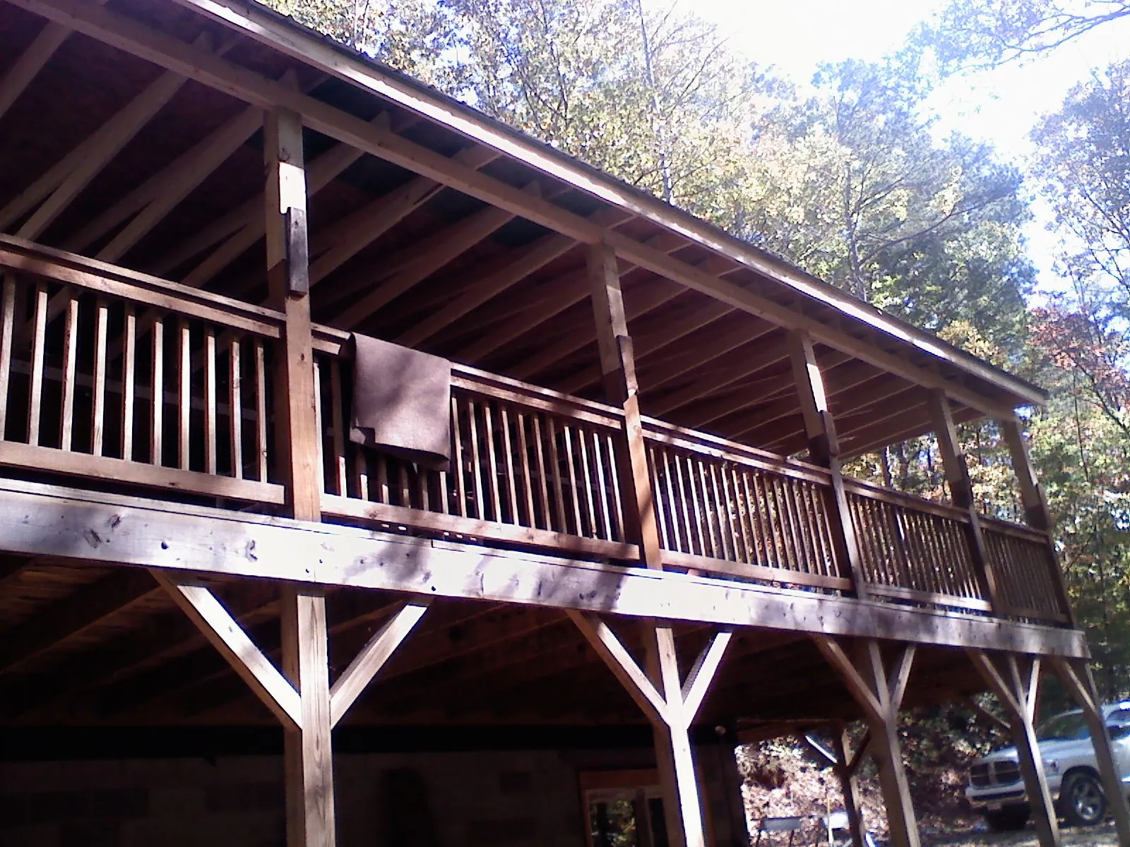 Timber framing under a new elevated porch and deck — Roof Leak Repair in Melrose by Roofing Brothers